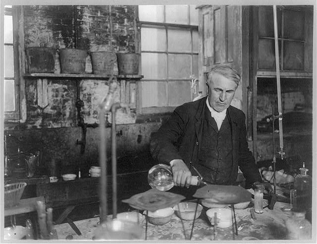 Thomas Edison working at a chemical laboratory bench, circa 1905
